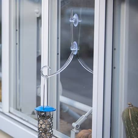 Clear window bracket with hanging nut feeder