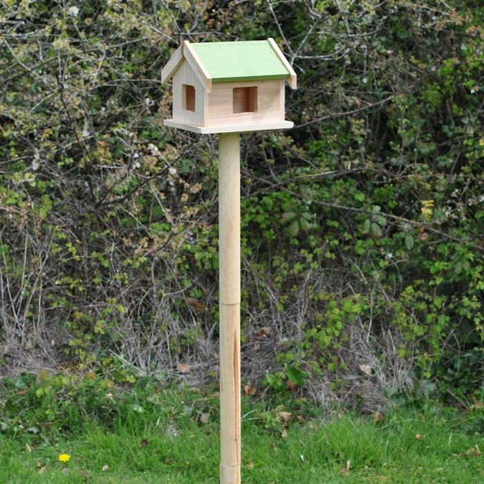 Pigeon proof bird table setup on lawn